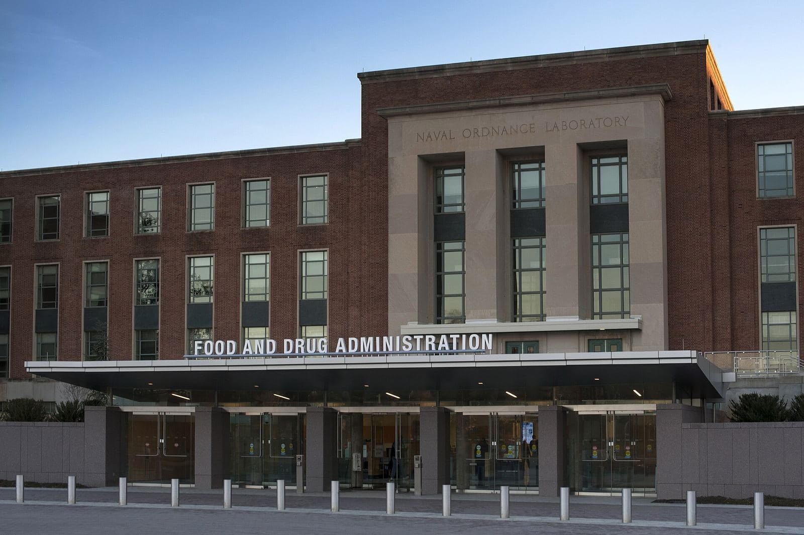 Brick and stone entrance of FDA Building 1 at the White Oak campus with the words Food and Drug Administration above the canopy